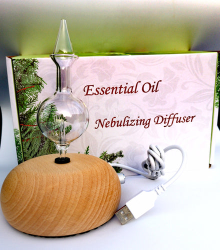 Wood and Glass Diffuser - Professional Aromatherapy diffuser for sale online in Ireland. Handcrafted wooden base and glass body. The most powerful essential diffuser for sale in Ireland. Diffuse essential oils. Best selling essential oil diffuser in Ireland. 